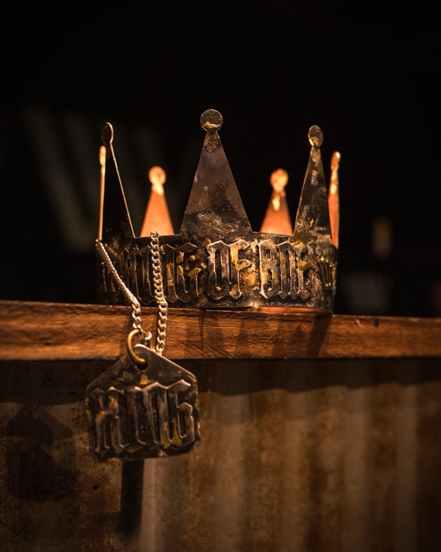 The King Of BNE crown on a timber bar, with its tag on a chain